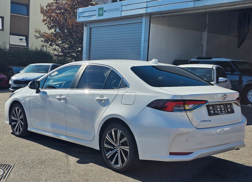 Toyota Corolla 2023 г. Белый, пробег 59479 км