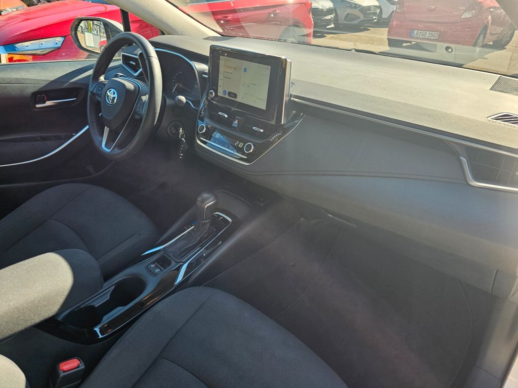 Toyota Corolla 2023 г. Белый, пробег 59479 км
