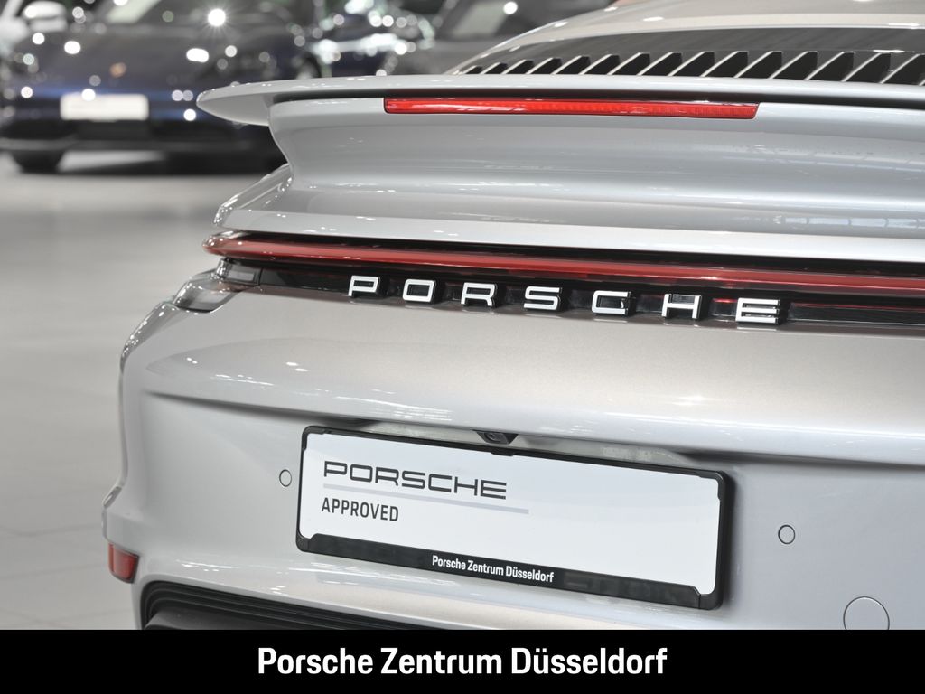 Porsche 992 2022 г. Серебристый, пробег 38354 км
