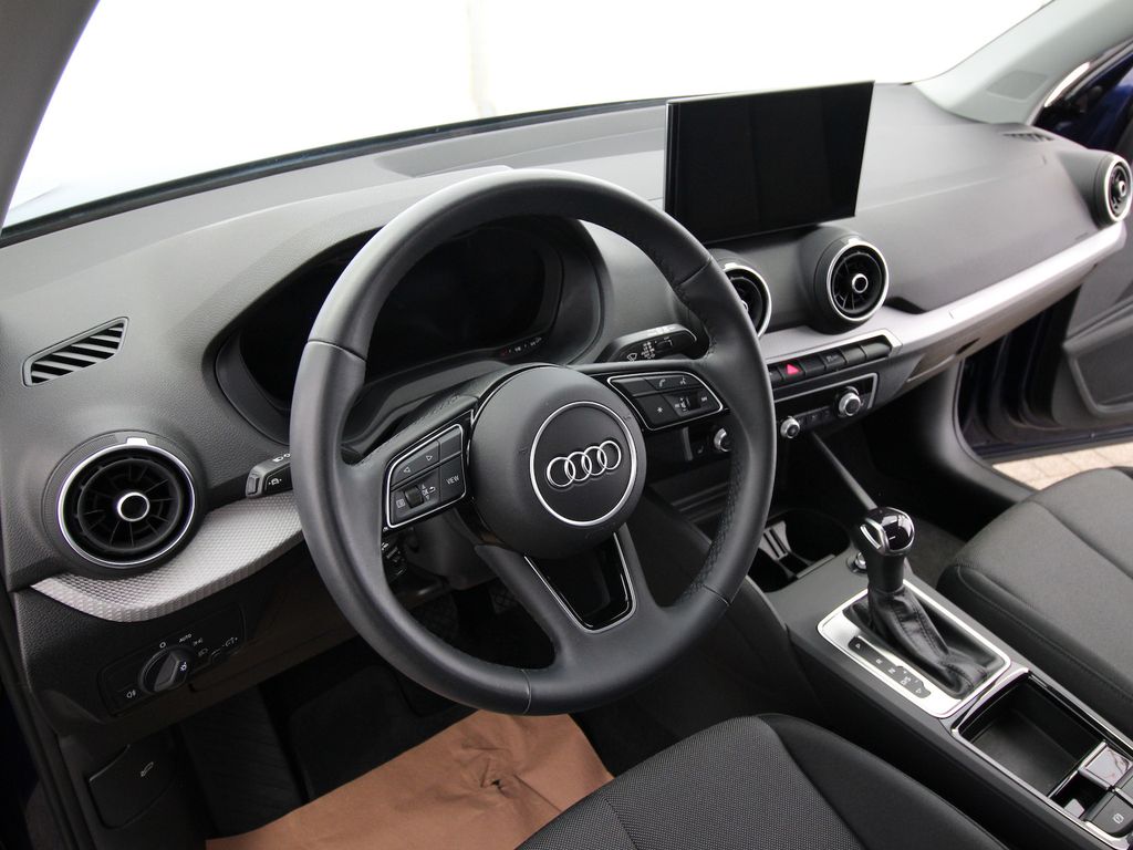 Audi Q2 2024 г. Синий, пробег 24245 км