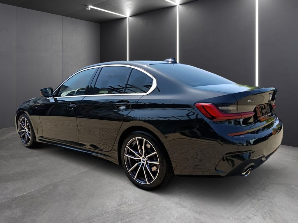 BMW 320 2021 г. Чёрный, пробег 54355 км