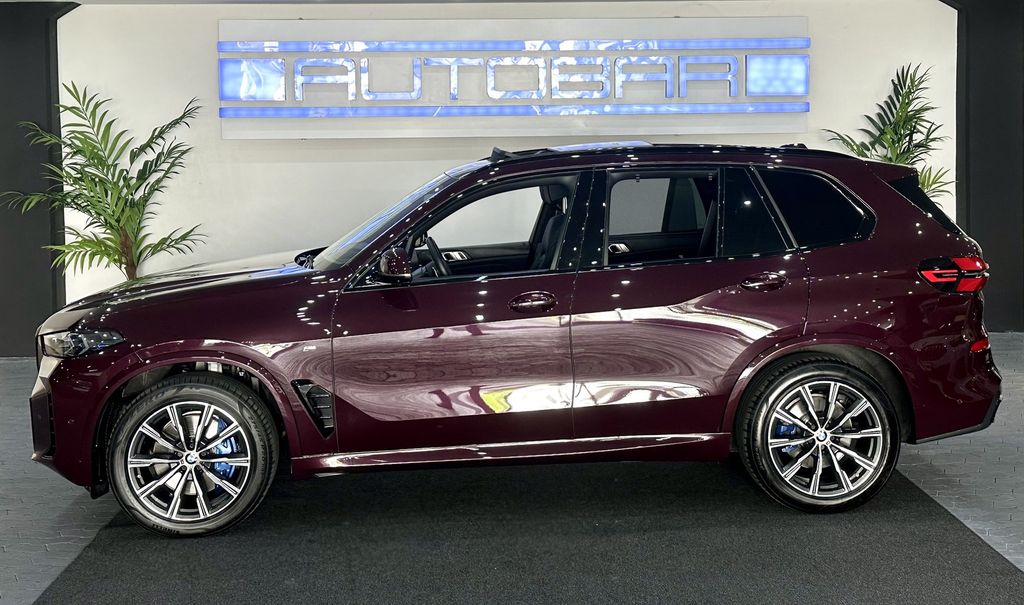 BMW X5 2024 г. Красный, пробег 44000 км