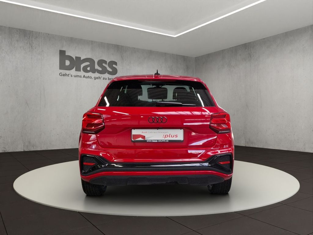 Audi Q2 2022 г. Красный, пробег 57061 км