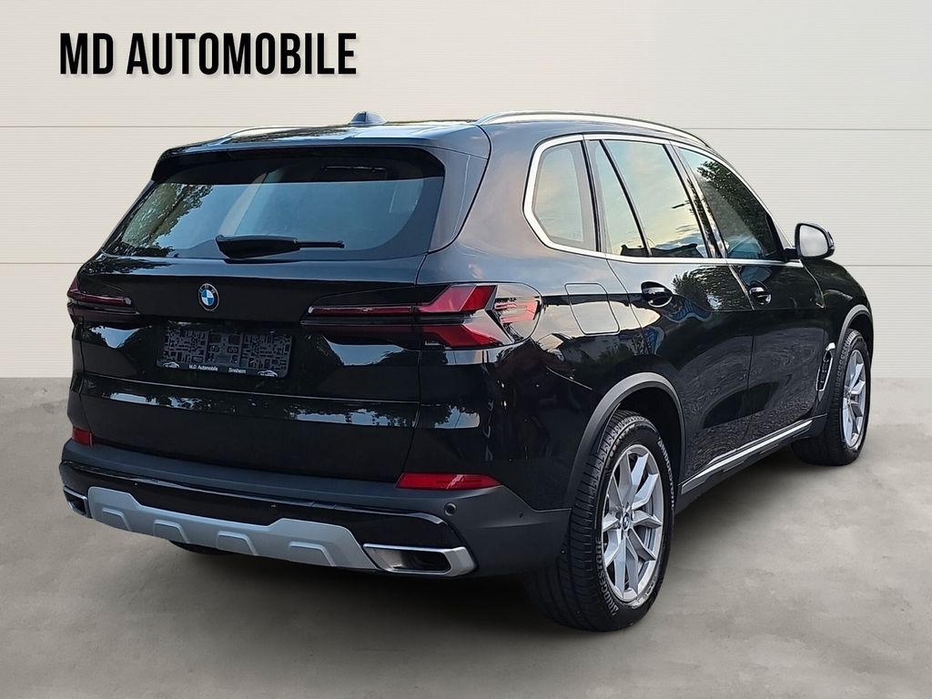BMW X5 2024 г. Чёрный, пробег 37000 км