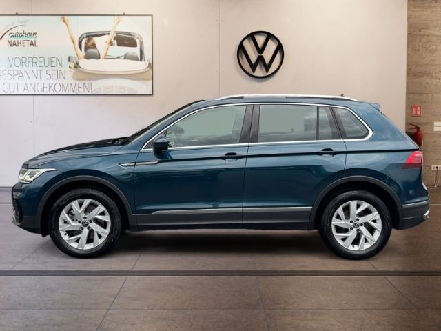 Volkswagen Tiguan 2023 г. Синий, пробег 34387 км