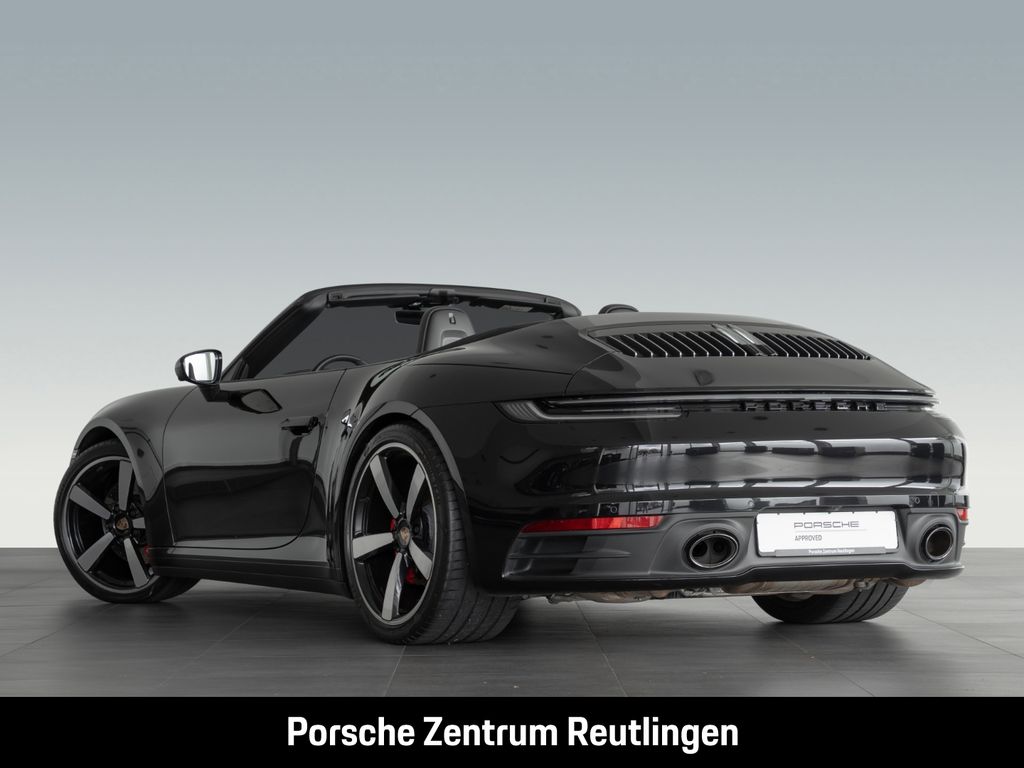 Porsche 992 2022 г. Чёрный, пробег 56600 км