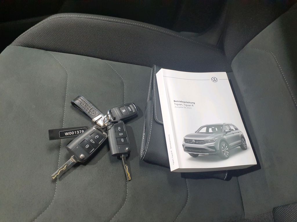 Volkswagen Tiguan 2023 г. Синий, пробег 56314 км