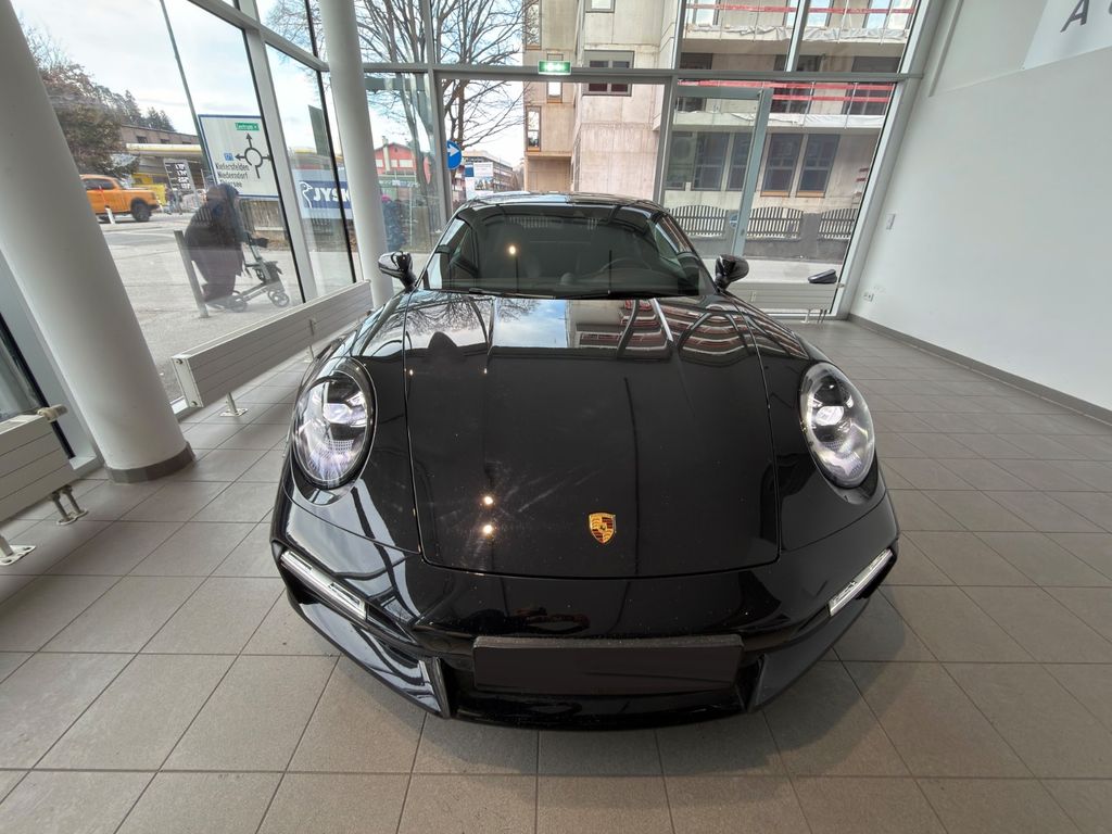 Porsche 992 2021 г. Чёрный, пробег 24030 км