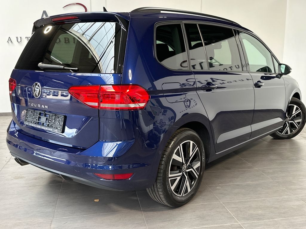 Volkswagen Touran 2024 г. Синий, пробег 54750 км