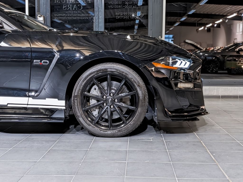 Ford Mustang 2021 г. Чёрный, пробег 33516 км