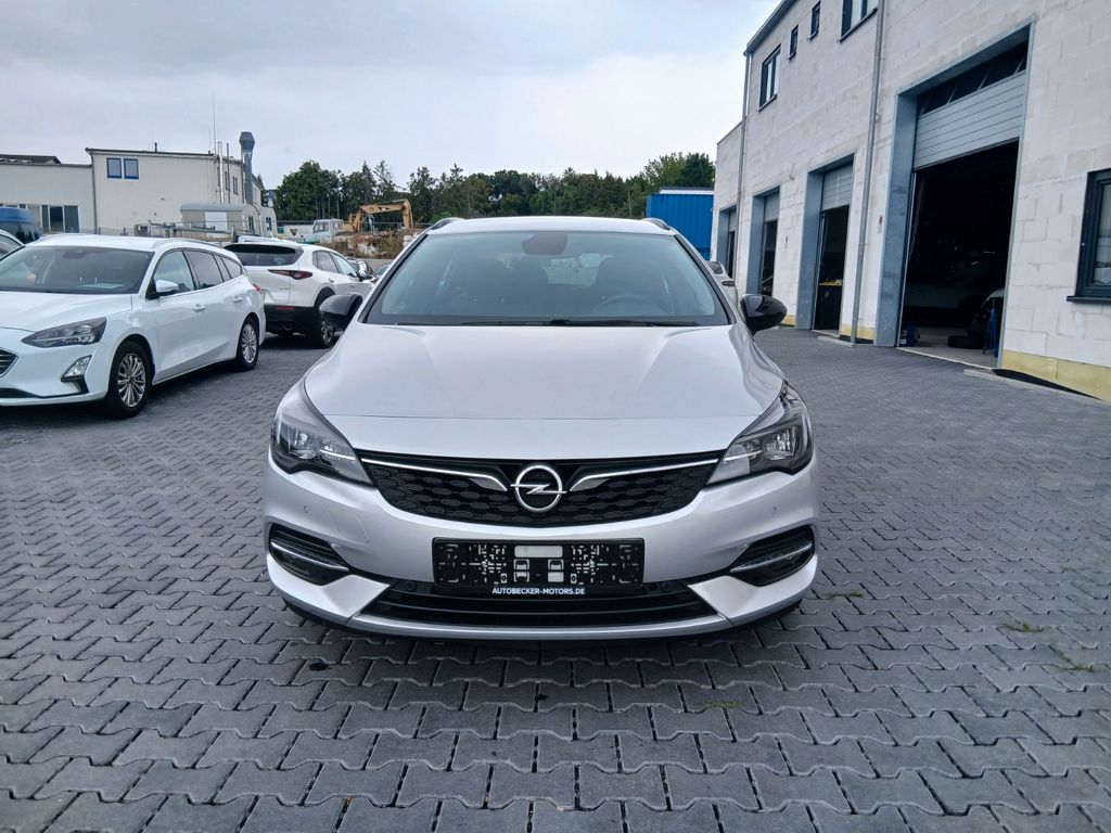 Opel Astra 2022 г. Серебристый, пробег 28590 км