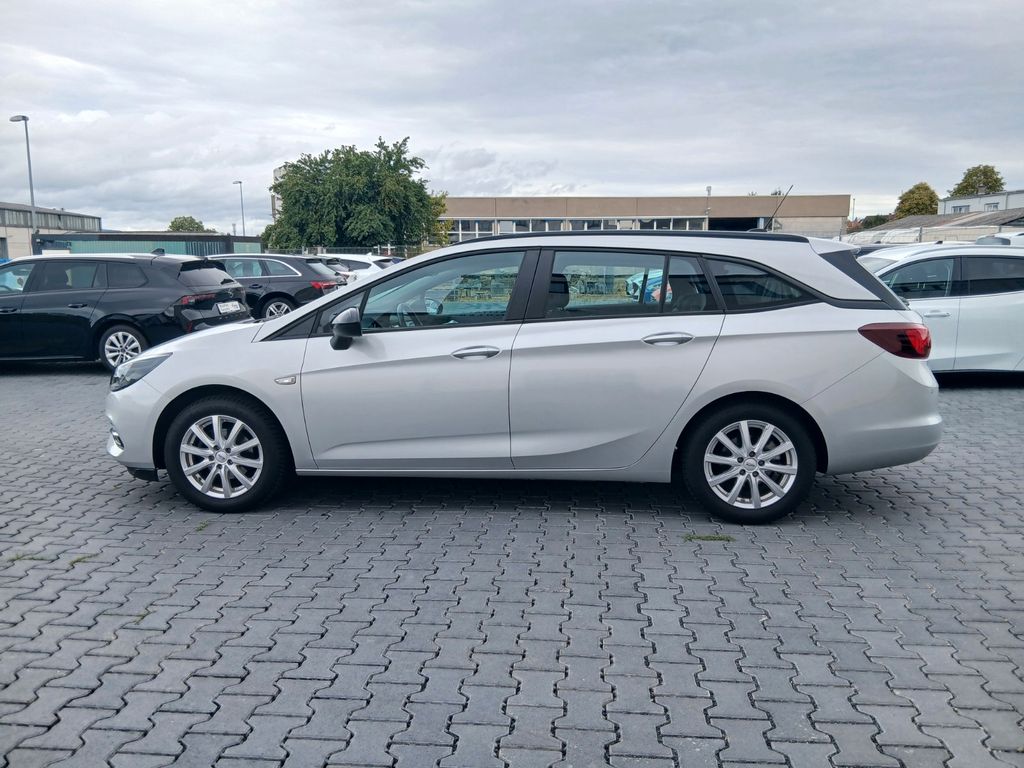Opel Astra 2022 г. Серебристый, пробег 28590 км