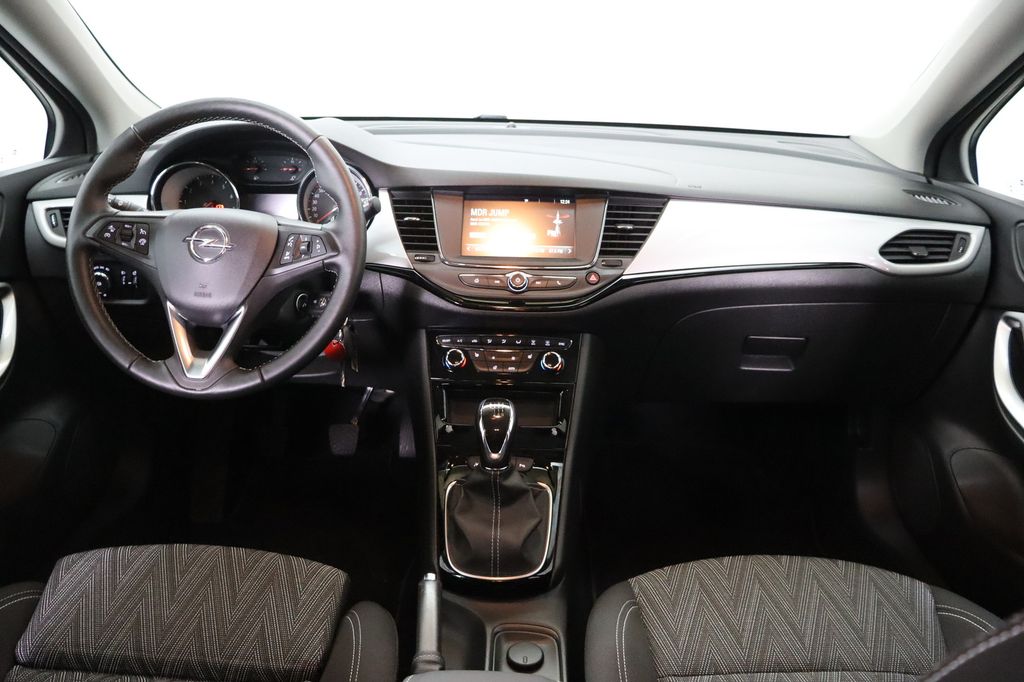 Opel Astra 2021 г. Красный, пробег 59987 км