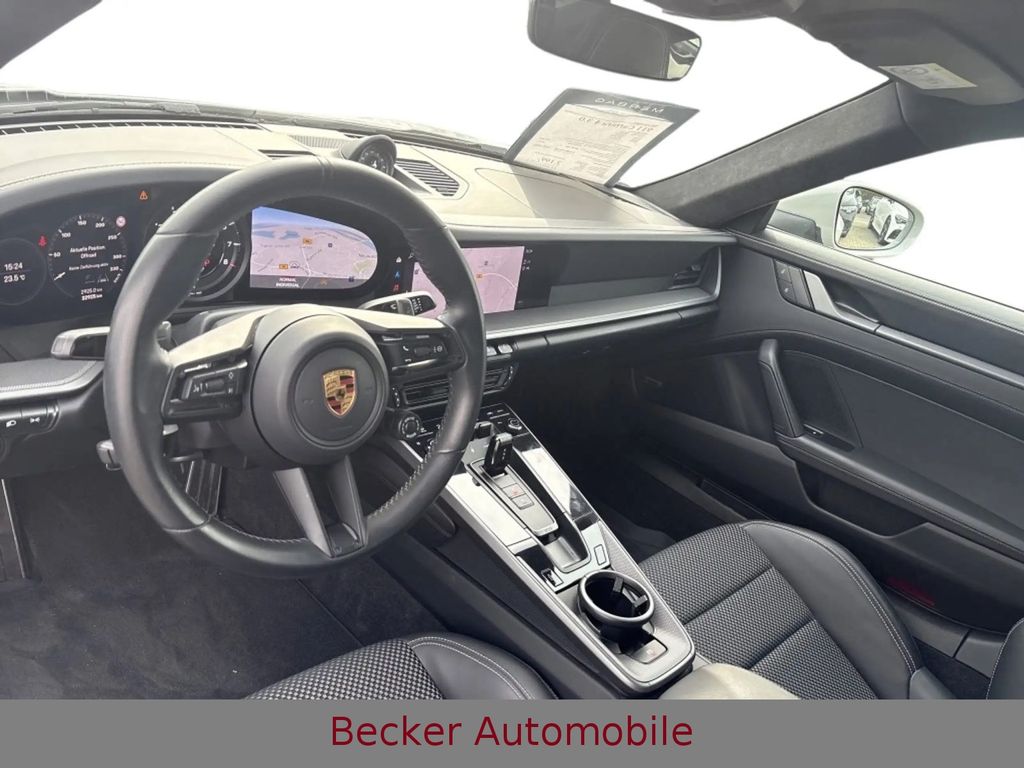 Porsche 992 2022 г. Серый, пробег 32990 км